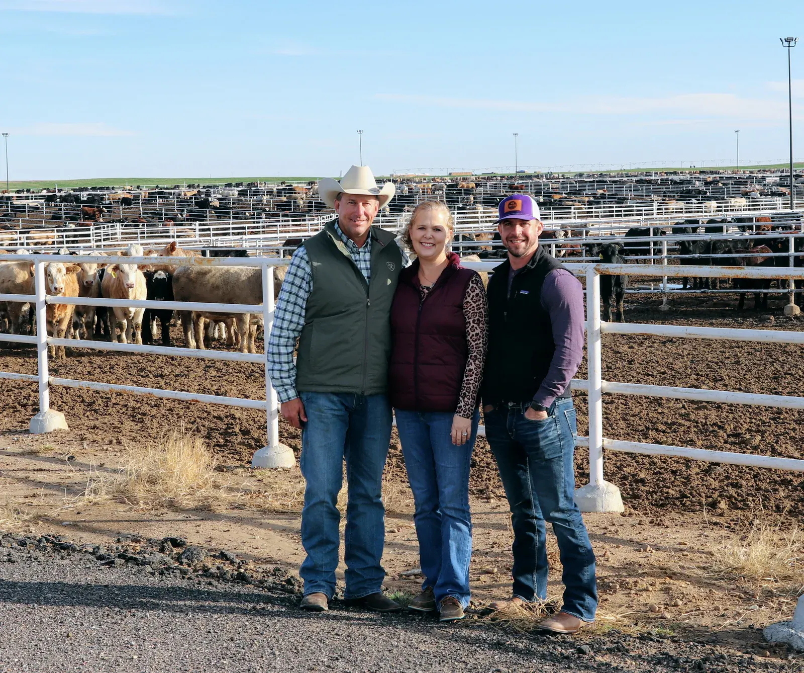 Keith and Tessa Bowman with Travis McGuire at Wilroads Feed Yard